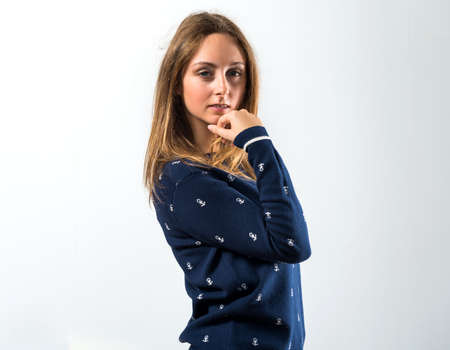 Blonde teen girl posing in studioの写真素材