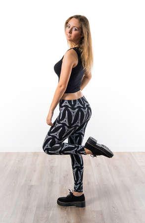 Blonde teen girl posing in studioの写真素材