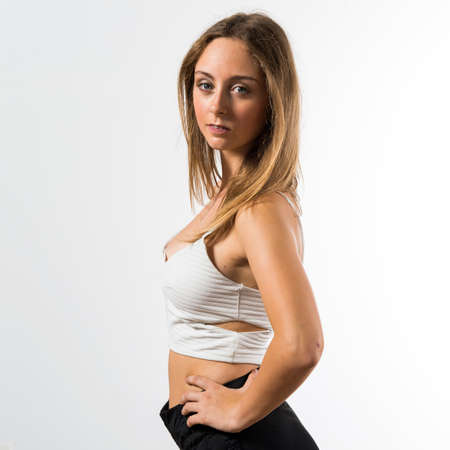 Blonde teen girl posing in studioの写真素材