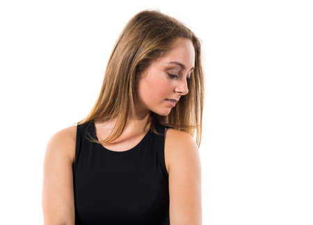 Blonde teen girl posing in studioの写真素材
