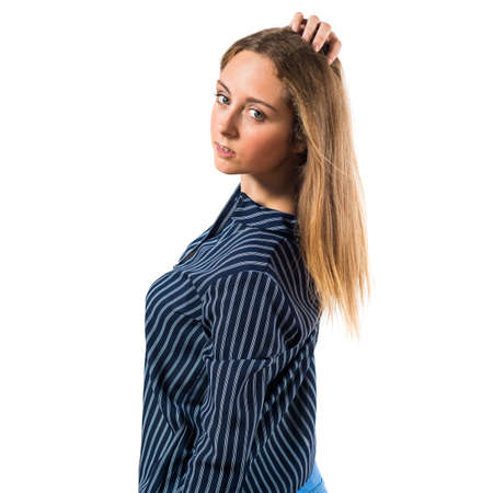 Blonde teen girl posing in studioの写真素材
