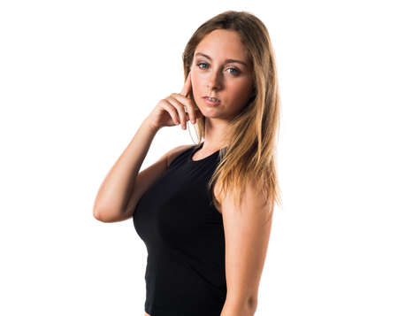 Blonde teen girl posing in studioの写真素材