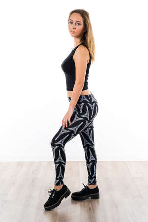Blonde teen girl posing in studioの写真素材
