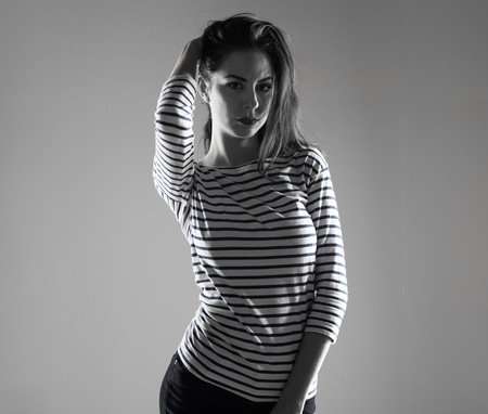 Beautiful model girl posing in studioの写真素材