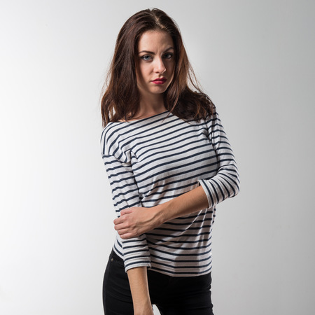Beautiful model girl posing in studioの写真素材