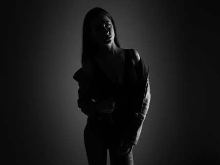 Young pretty model woman posing in studioの写真素材