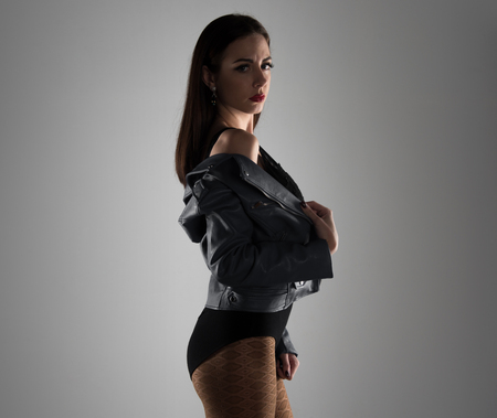 Young pretty model woman posing in studioの写真素材