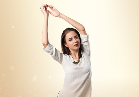 Young pretty model woman posing in studioの写真素材