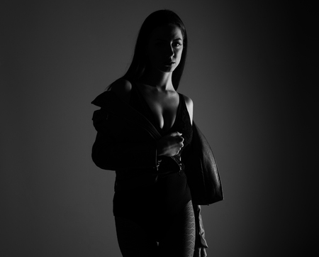 Young pretty model woman posing in studioの写真素材