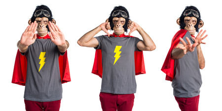 Superhero monkey man doing bad signalの写真素材