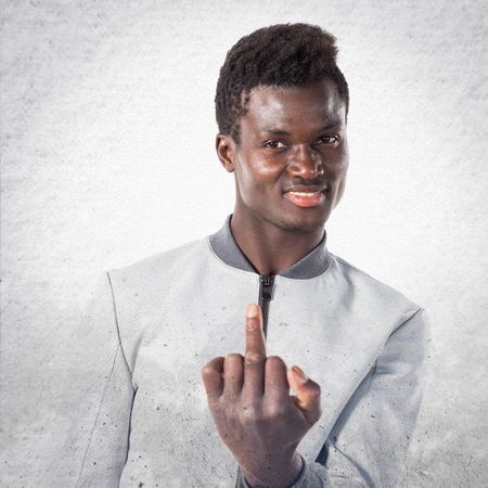 Black man making horn gestureの写真素材