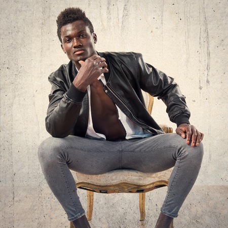Handsome black man with leather jacketの写真素材