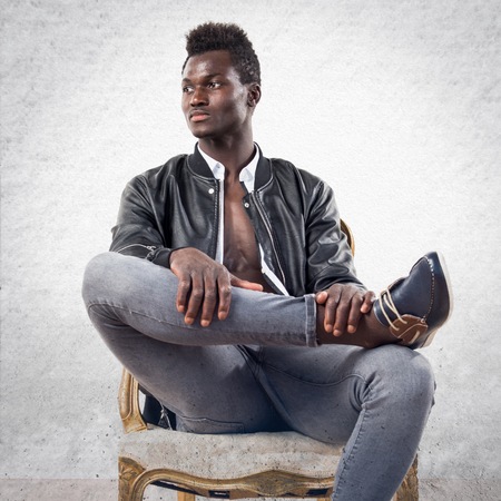 Handsome black man with leather jacketの写真素材