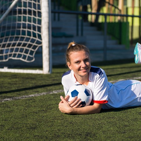 Pretty football woman playerの写真素材