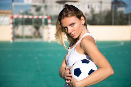 Pretty football woman playerの写真素材