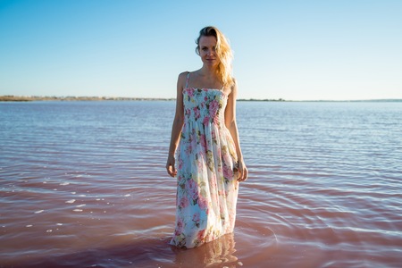 Blonde woman in a beautiful salt lake
