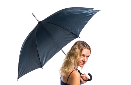 Beautiful blonde girl holding an umbrellaの写真素材