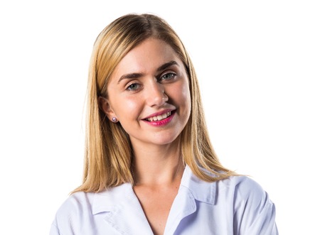 Doctor woman smiling with her arms crossedの写真素材