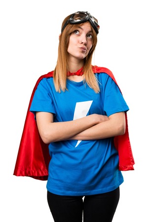 Pretty superhero girl thinkingの写真素材