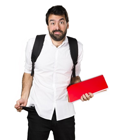 Ruined student man looking money in their pocketsの写真素材