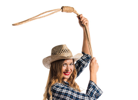 Sexy blonde woman cowgirlの写真素材