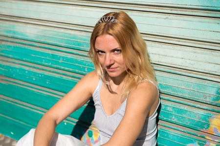 Pretty blonde woman in the street