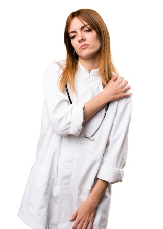 Young doctor woman with shoulder painの写真素材