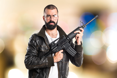 Pimp man holding a rifle