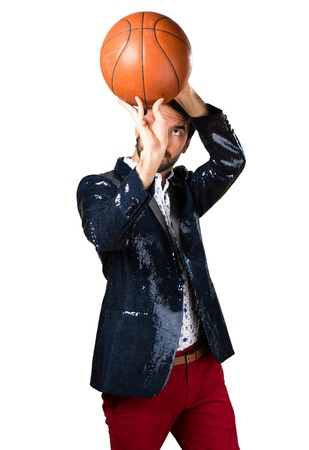 Man with jacket holding a basket ballの写真素材