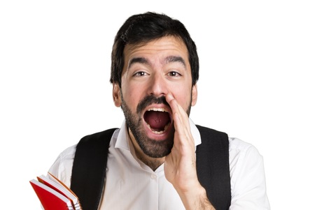 Student man shoutingの写真素材