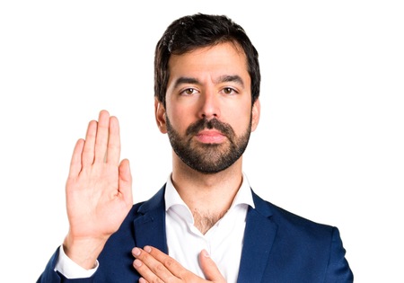 Handsome man making an oathの写真素材