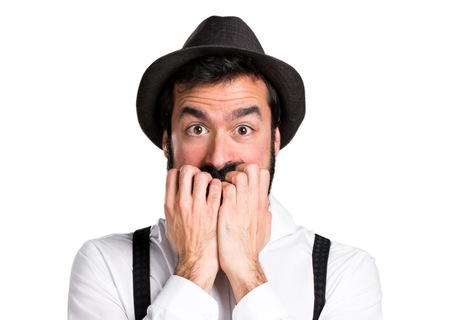 Frightened hipster man with beardの写真素材