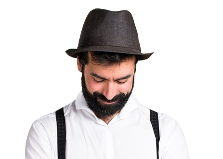 Hipster man with beard looking downの写真素材