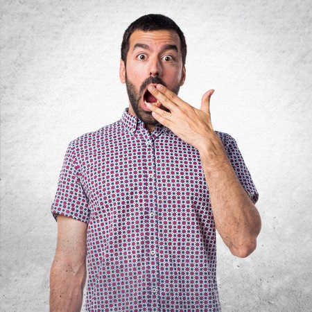 Handsome man doing surprise gestureの写真素材