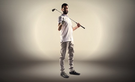 Golfer man with thumb upの写真素材