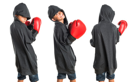 Kid with boxing glovesの写真素材