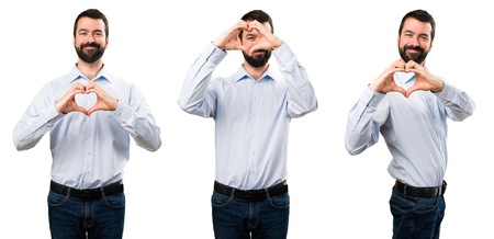 Set of Handsome man with beard making a heart with his handsの写真素材