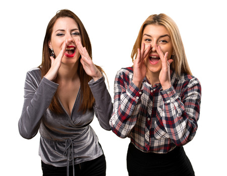 Two friends shoutingの写真素材