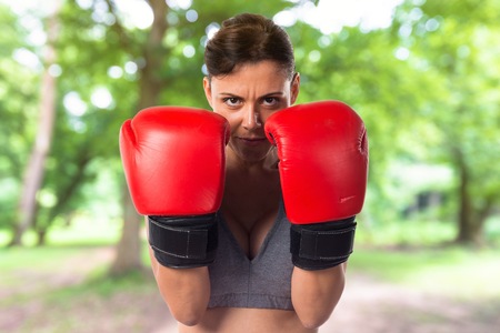 Sport woman with boxing glovesの写真素材