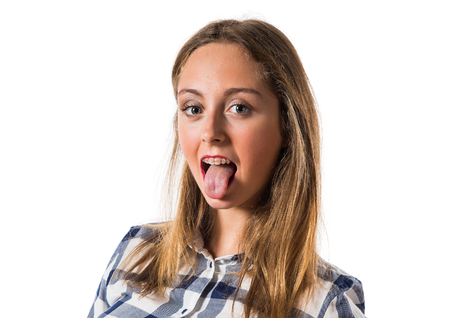 Blonde teen girl making a jokeの写真素材