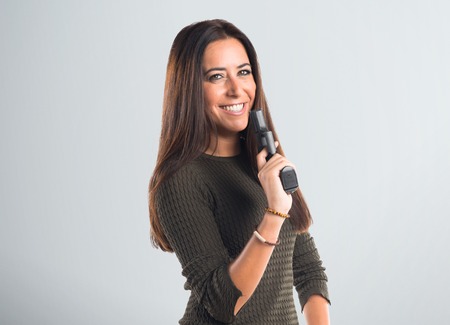 Woman holding a pistol
