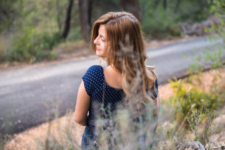 Pretty young blonde girl in outdoorsの写真素材