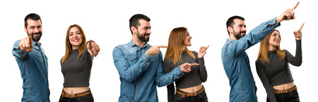 Set of Man and woman pointing to the lateral and to the front