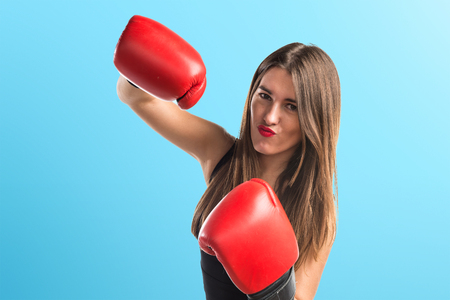 Girl with boxing glovesの写真素材