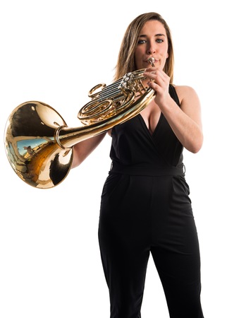 Girl playing the french hornの写真素材