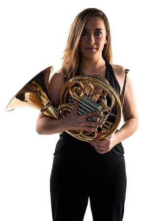 Girl playing the french horn