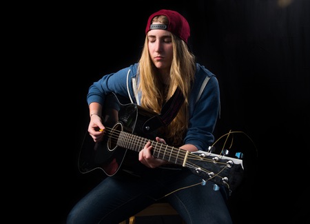 Girl playing guitar