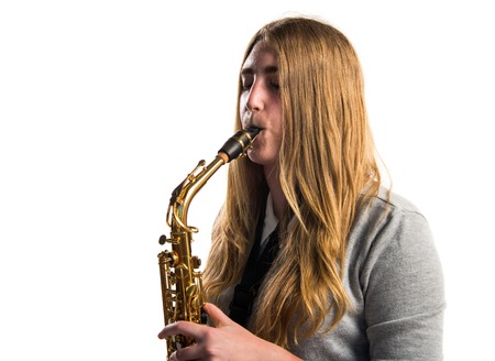 Girl playing the saxophoneの写真素材