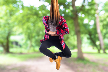 Girl jumping in hip hop styleの写真素材