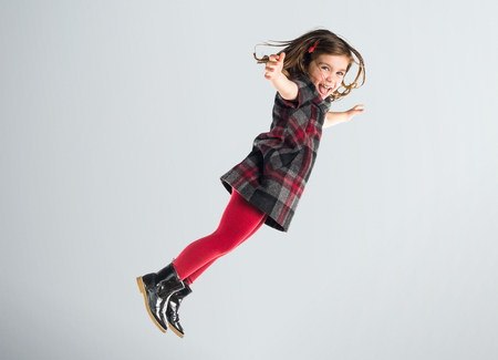 Little girl flyingの写真素材